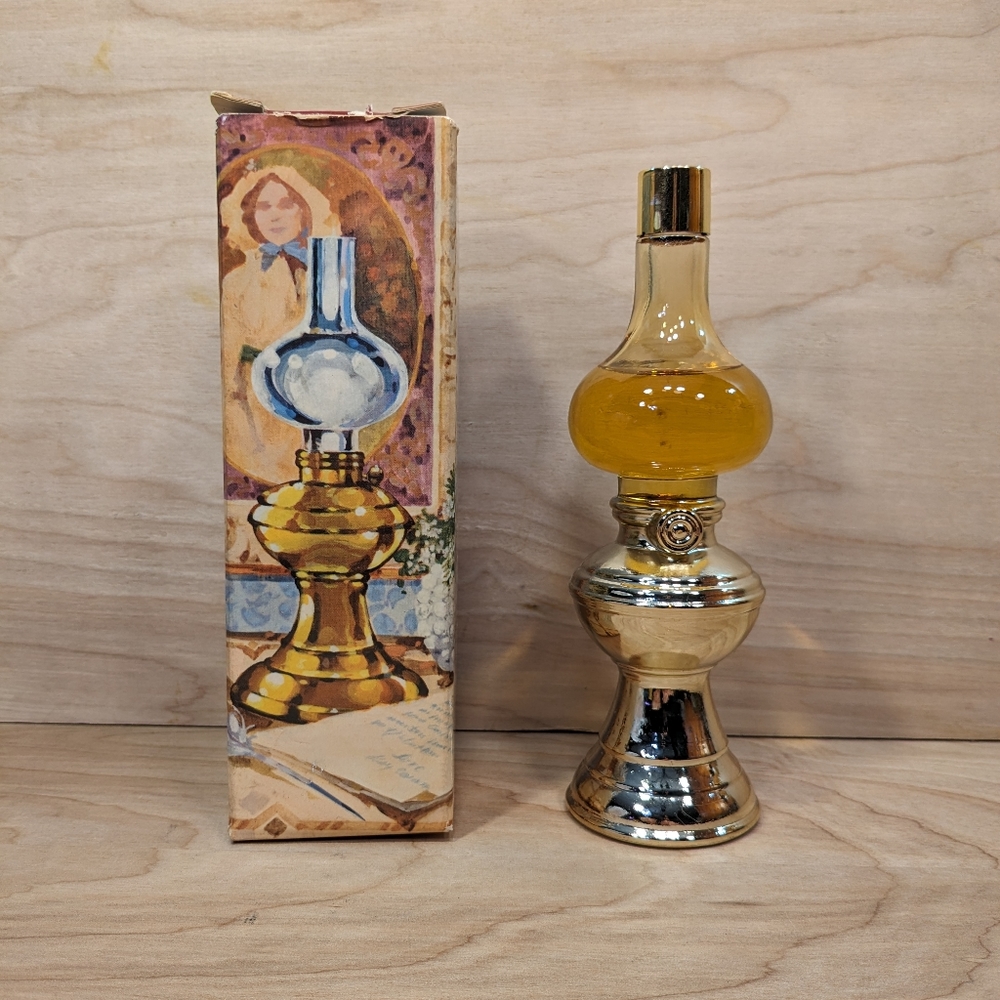 2/3 full Avon 1970s Charisma Glass Unicorn Perfume. Bottle measures approx. 5.75